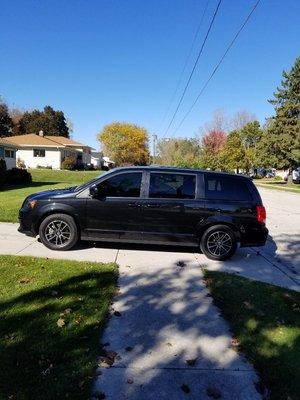 This is a 2016 Grand caravan with tinted windows and storage in back and under the back seats and can seat up to 6 passengers.