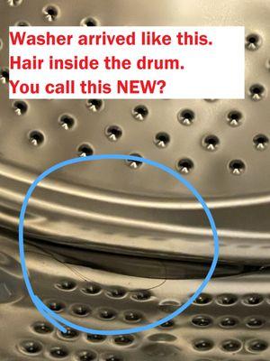 Machine was sold as "NEW" and delivered with multiple hair inside the drum...
