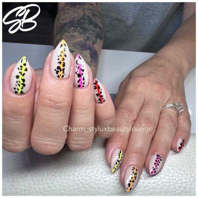 Give our new talent Charm a try. She has great skills in not just artificial nails and designs but manicures and pedicures. Book with her.