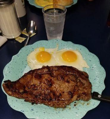 Fried pork chop and eggs