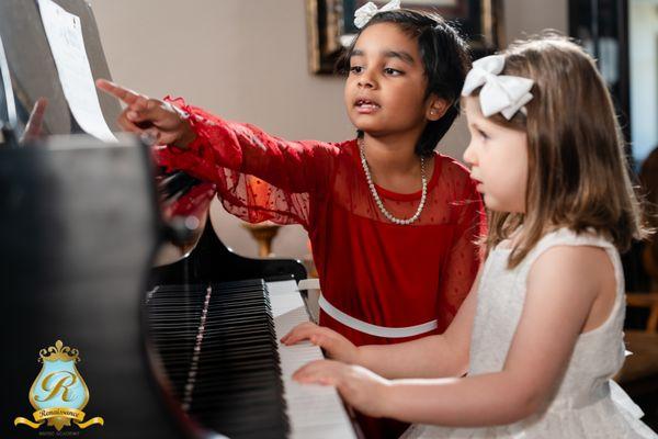 Renaissance Music Academy students learning piano together