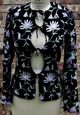 Embroidered wool jacket with gemstone beaded trim.