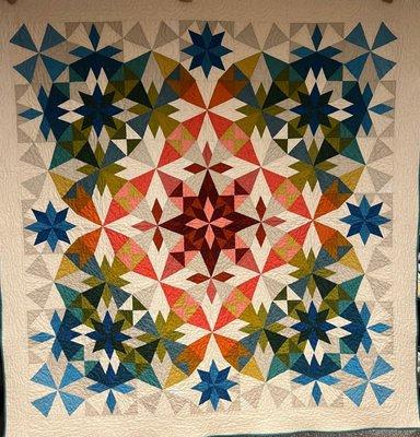 Here is one of Alaska's most prominent icon, the Aurora Borealis in a quilt.  Pattern and templates available.