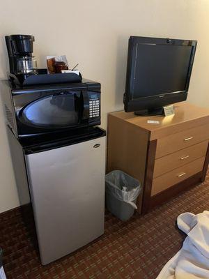 Mini fridge, microwave, coffee.