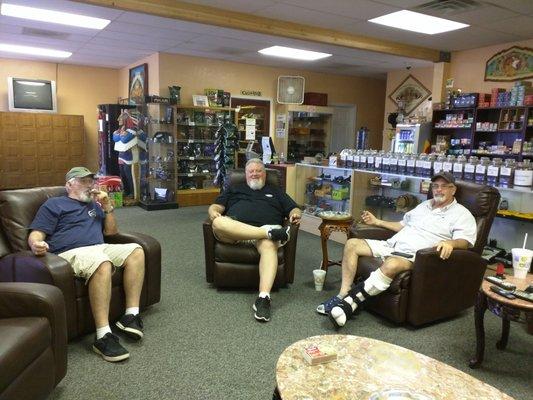Some of the regulars at MD Cigar lounge, open on Sunday.