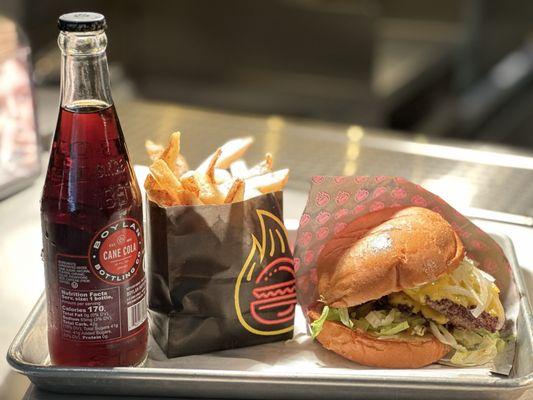 Cane cola, order of fries and a double hot chard burger