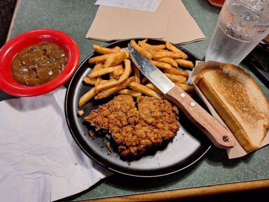 Fried chicken with french fries.