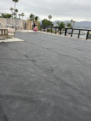 Weed blocker fabric for artificial turf installation