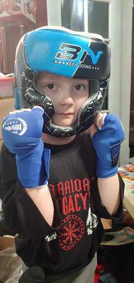 Photo by me. Showing off her knew helmet, gloves and shirt.