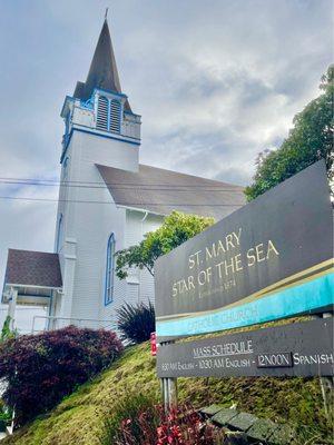 Exterior with mass times. Spanish mass option.