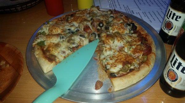 It takes a while to bake, but the pizza was pretty big and tasty.