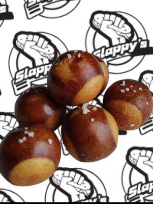 Salted Pretzel Bites - Deep fried pretzel bites tossed in sea salt...goes great with our craft beer cheese sauce!