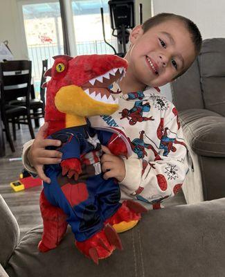 Red Dino with captain America pjs and shield.