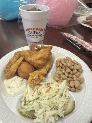 Goodness on this plate: Catfish, chicken, white beans, coleslaw & hush puppies!