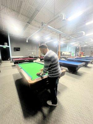 Handsome man playing pool all mine