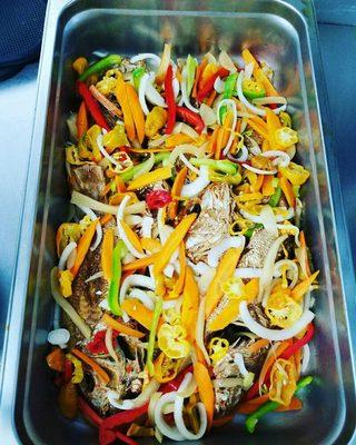 ESCOVEITCH SNAPPER FISH Snapper deep fried,in a vinaigrette sauce w/onions,green&red peppers,choyote (chocho)habanero peppers & carrots!