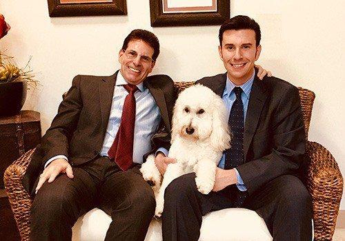 My wonderful son, Brandon, co-counsel at the firm and my beloved dog, Shaina