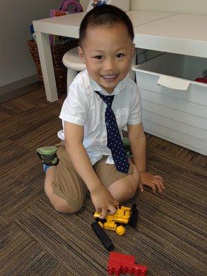 Our patient of the day wins a prize he can't wait to test out!