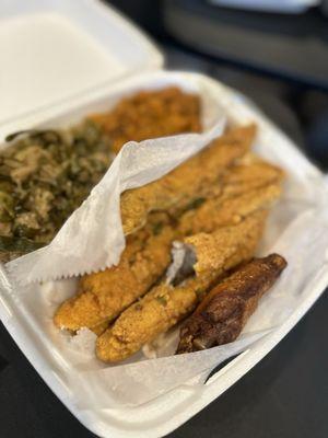 Fried whiting, fried cabbage and yams