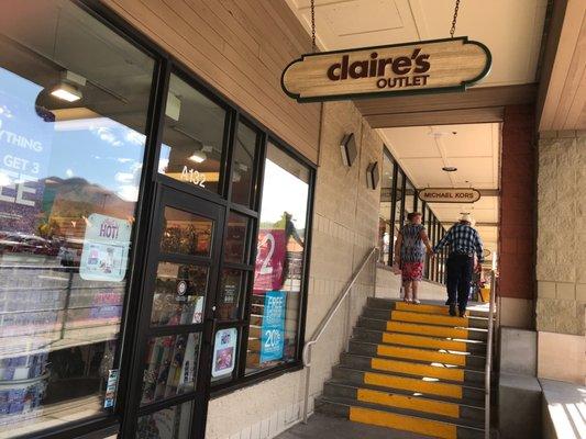 Lower level, between the Michael Kors and Adidas outlets...