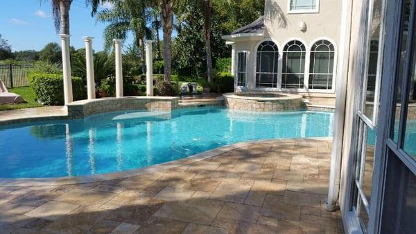 Pool remodel. New travertine deck tile and coping. Also installed pool tile and quartz plaster.