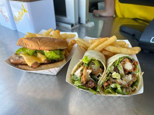 This was our Crispy Chicken Cesar wrap and a chicken breast sandwich with fries.