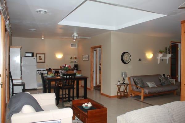 Well stocked kitchen with full refriderator and stove.