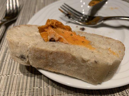 Spread that tomato basil sauce on the complementary bread