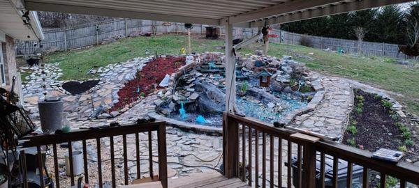 Backyard Pond Project in Progress. All Stone Work, Pond Work, and Flowerbeds in Contract