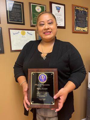 Receiving an award for the excellent service to our community