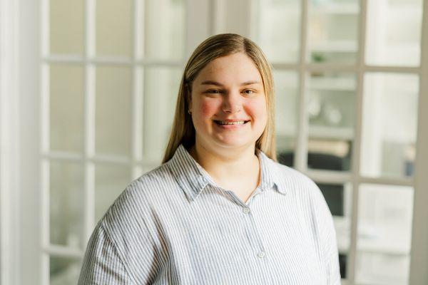 Woman smiling. She provides counseling for young adults katy, tx and marriage counseling katy, tx.