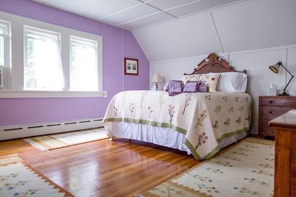 The Spring Room has a comfortable Queen bed and a lovely sitting area.