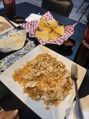 My wife ordered Arroz Con Pollo, rice with chicken.