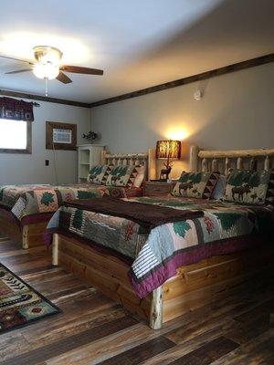 Suite Room 8 - Two custom made Queen-size cedar platform frame beds, Oliver & James mattresses (one firm & one plush), new window A/C unit.