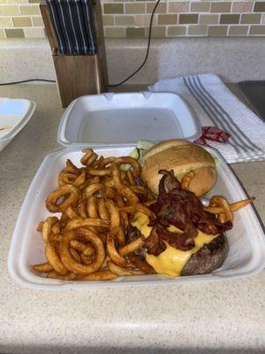 Joes Diner Burger medium rare with curly fries (2.00) more