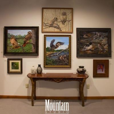 Inside art gallery at Giant Mountain Studio. Paintings: Denise Leavitt, pottery: Yvonne Wild, table: Jon Swartwout. December 2015.