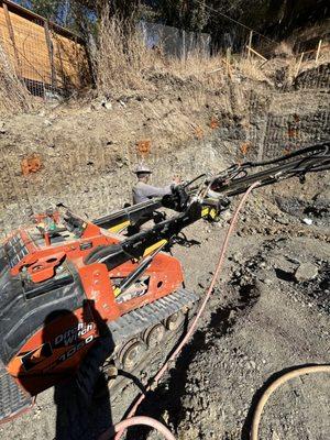 Tiebacks for retaining wall