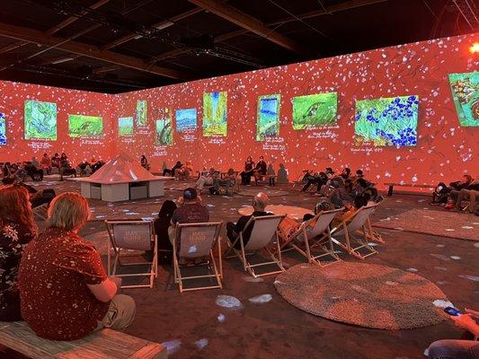 Immersive room. You can sit on the rugs as well!