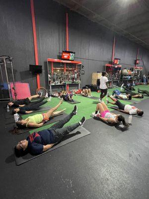 Core work in group training session.