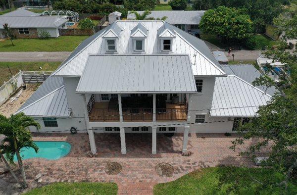 From tear-off to standing seam -- this residential metal roofing project showcases precision craftsmanship.