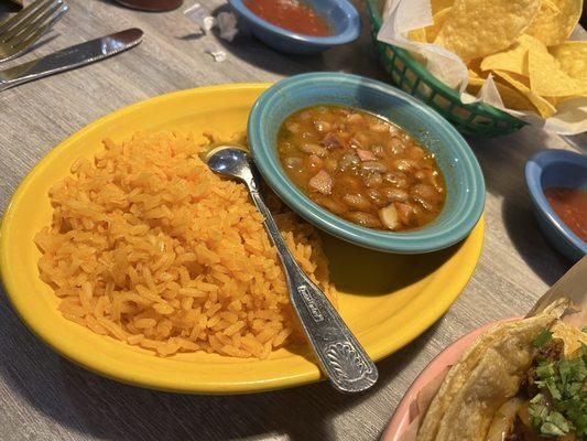 Rice, with a side of a delicious bean dish!