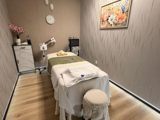 Facial treatment room set up for a relaxing skincare session.