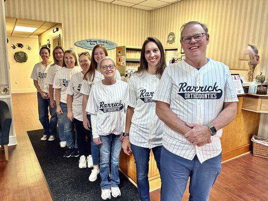 The Rarrick Orthodontics team shows their spirit in matching jerseys and smiles, ready to make every patient feel at home!