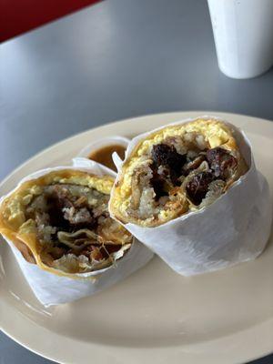 Bacon breakfast burrito with sausage.