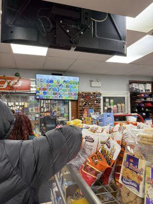 Everyone plays the lottery here. Nobody buys gas here. It's a parking lot, not a gas station