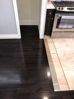 Caesar extended the wood floors right up to our kitchen.