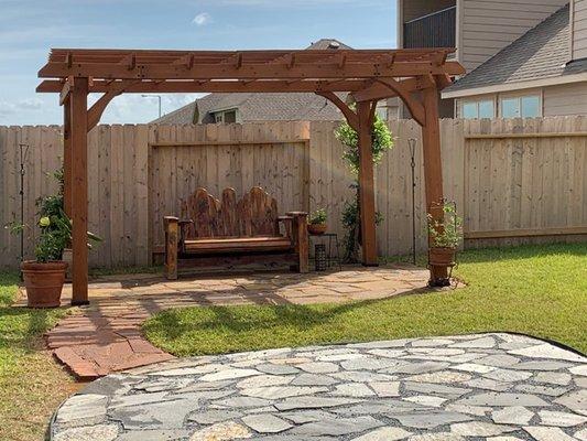 Pergola and Flagstone Patio designs, builds, and installs custom high quality pergolas to enhance your backyard
