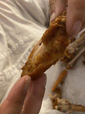 This is one of the wings with the hair fried into it