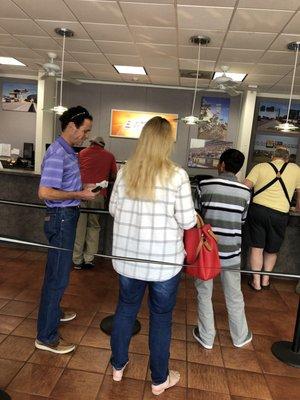 Long line but it's pleasant and people are being helped. March 2019.