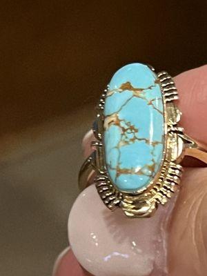 Turquoise ring set in gold.